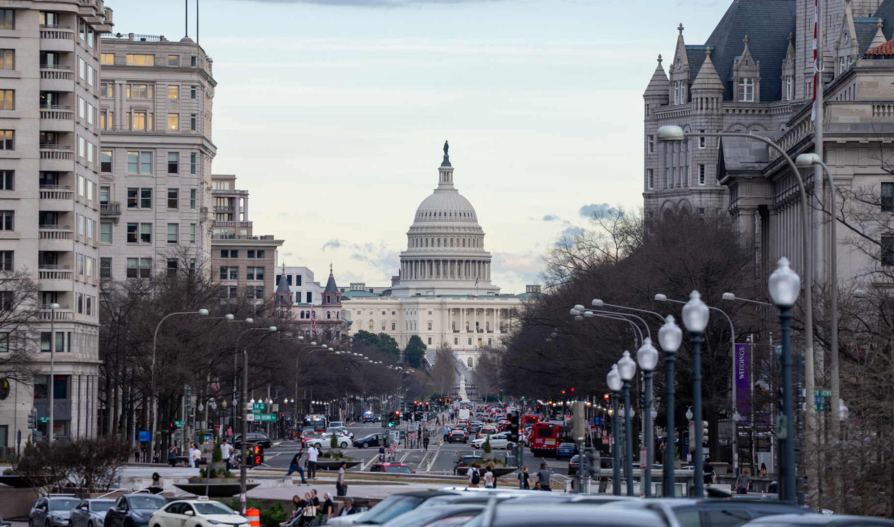 shot of street with capitol building in background